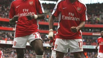 Emmanuel Eboue celebrates scoring the 4th Arsenal goal with Alex Song