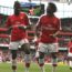 Emmanuel Eboue celebrates scoring the 4th Arsenal goal with Alex Song